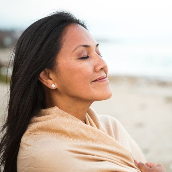 Relaxed woman at beach